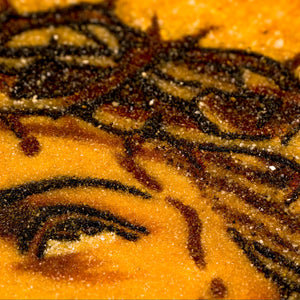Close-up of BalticBliss genuine amber artwork featuring Jesus Christ’s crown of thorns and expressive eye, handcrafted from natural Baltic amber stones, highlighting intricate Lithuanian amber artistry and fine textured details.