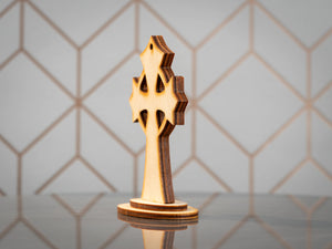 Side view of BalticBliss genuine amber wooden Celtic cross on stand, layered Baltic birch construction with natural amber inlay, authentic Lithuanian handmade amber cross religious dΓ©cor souvenir.