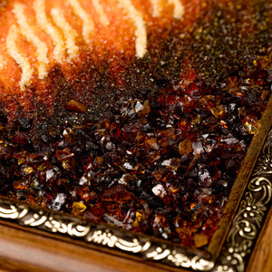 Detail of BalticBliss genuine amber wildlife painting showing rich dark cognac Baltic amber chips and gradient fur texture, ornate gilded frame corner, authentic Lithuanian handmade amber art for luxury home décor.